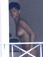 Rihanna caught naked when changing bikinis