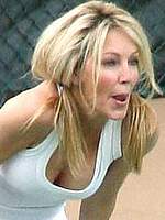 Heather Locklear looking sexy on a tennis court