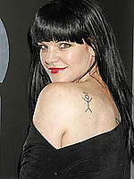 Pauley Perrette in black dress at Grammy